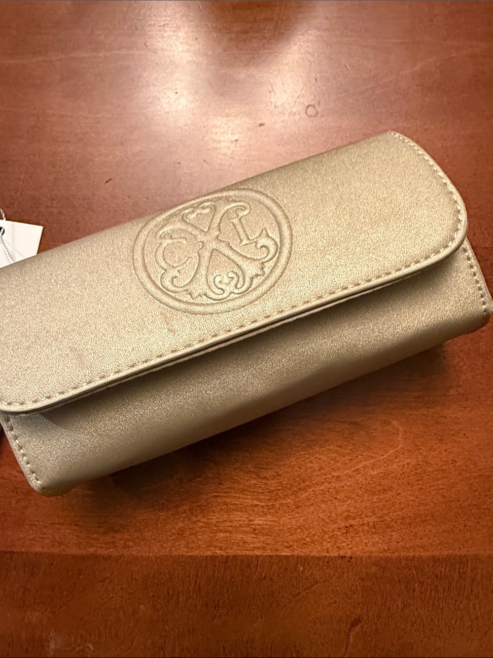 Christian Lacroix Metallic Gold Embossed Logo wristlet wallet Clutch